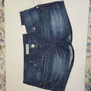 Guess dark wash denim shorts with Guess embroidered on the back with rhinestone